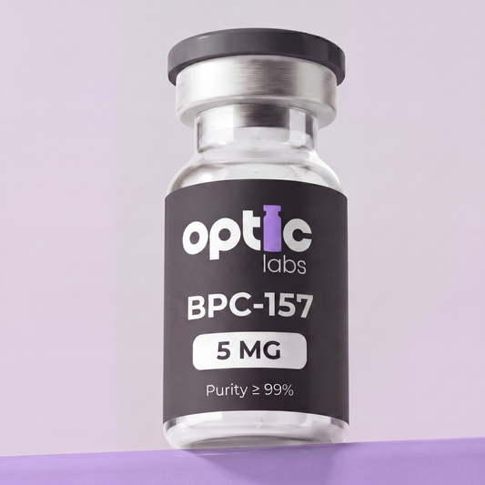 A clear vial labeled Optic Labs BPC-157 5mg/10mg, with a black label featuring white and purple text, stands upright against a soft purple background, highlighting this high-purity, lab-tested peptide. Optic Labs Au
