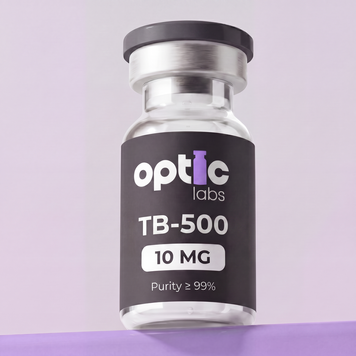 A glass vial of Optic Labs TB-500 5mg / 10mg with a black and white label rests on a purple surface against a light purple background. Optic Labs Au